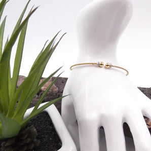 Bracciale schiava a cerchio rigido in argento dorato
