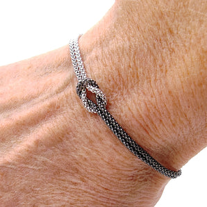 Bracciale in Argento 925 Bicolore con Intreccio Centrale – Eleganza e Design Artigianale