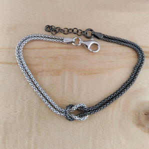 Bracciale in Argento 925 Bicolore con Intreccio Centrale – Eleganza e Design Artigianale