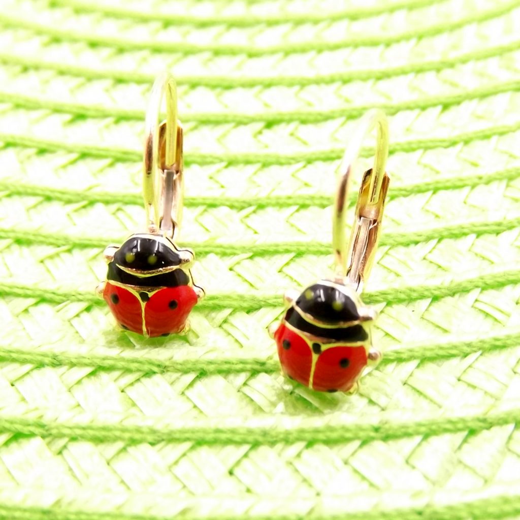 Orecchini Love Knot in oro giallo con triplo nodo in vendita su Italia Orecchini Love Knot in oro giallo con triplo nodo in vendita su Italia